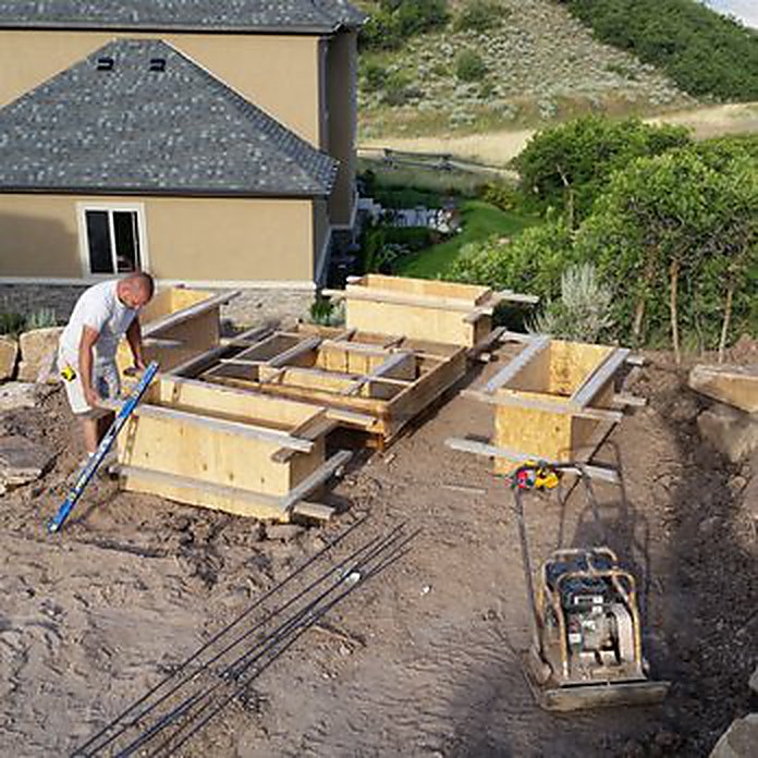 Rebar and forms being set for a new foundation